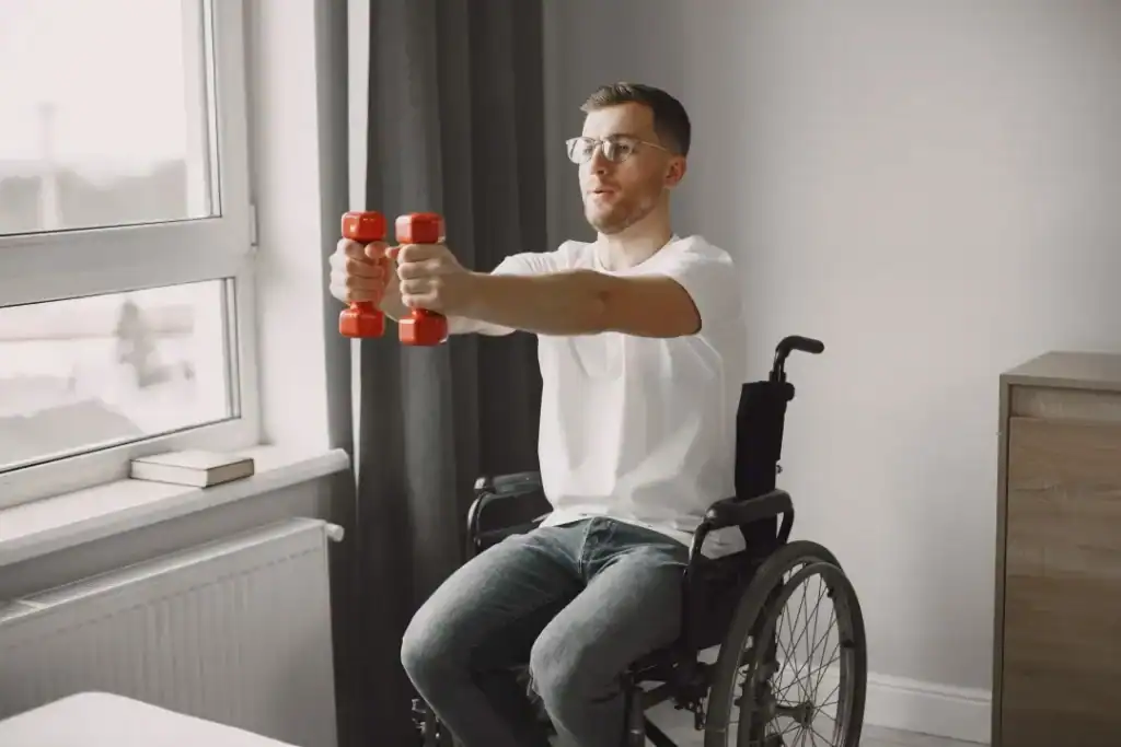 Image of man doing exercise in his wheelchair to aid weight loss Sutton Coldfield