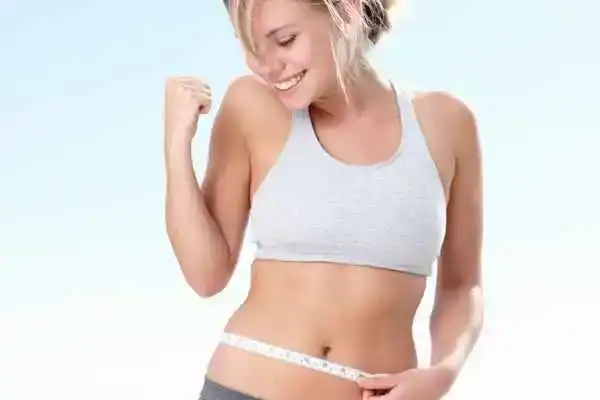 Unraveling the Mystery: Where Does the Body Fat Loss From First? 3 Image of woman happy with fat loss Sutton Coldfield